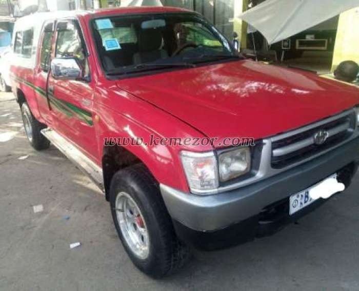 1999 maroon toyota hilux 4x4 pickup